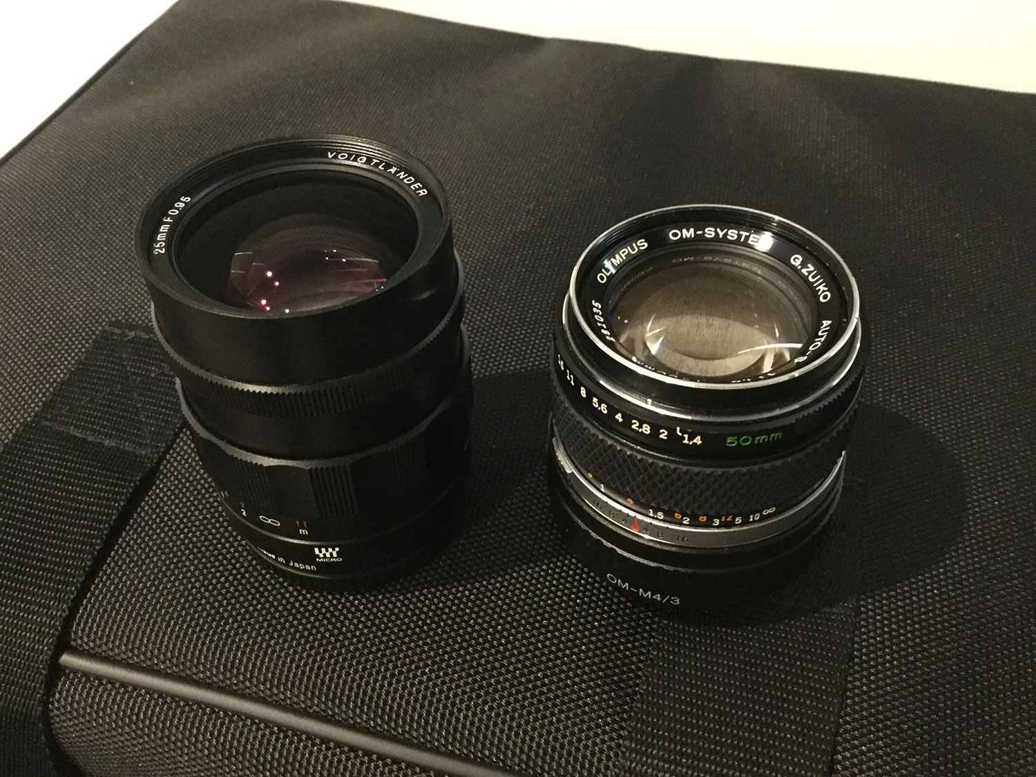 micro four thirds Voigtlander 25mm lens with Olympus OM 50mm